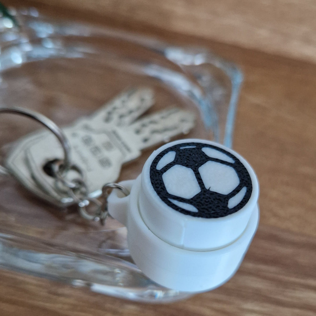 Klickbarer Anti-Stress-Schlüsselanhänger Fußball
